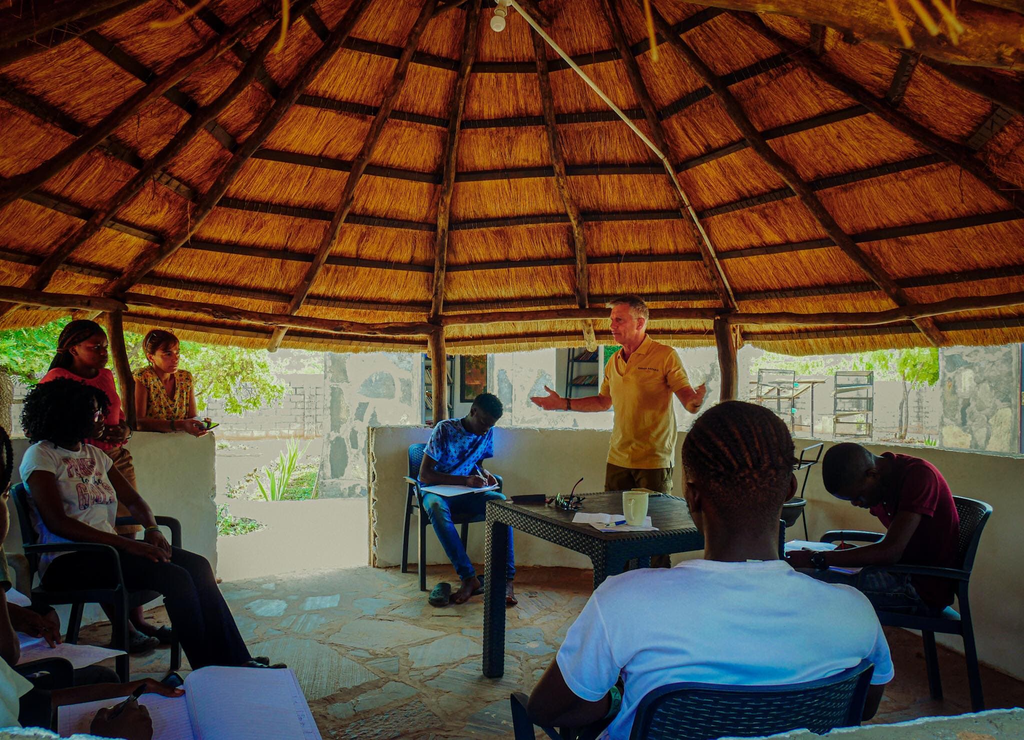 Keith teaching students under the insaka